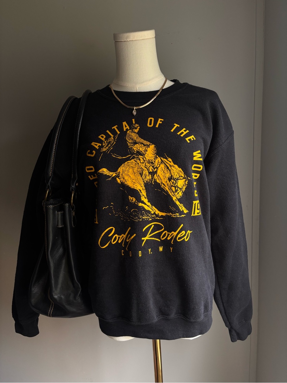 Black Cody Rodeo Sweatshirt with bucking bronco